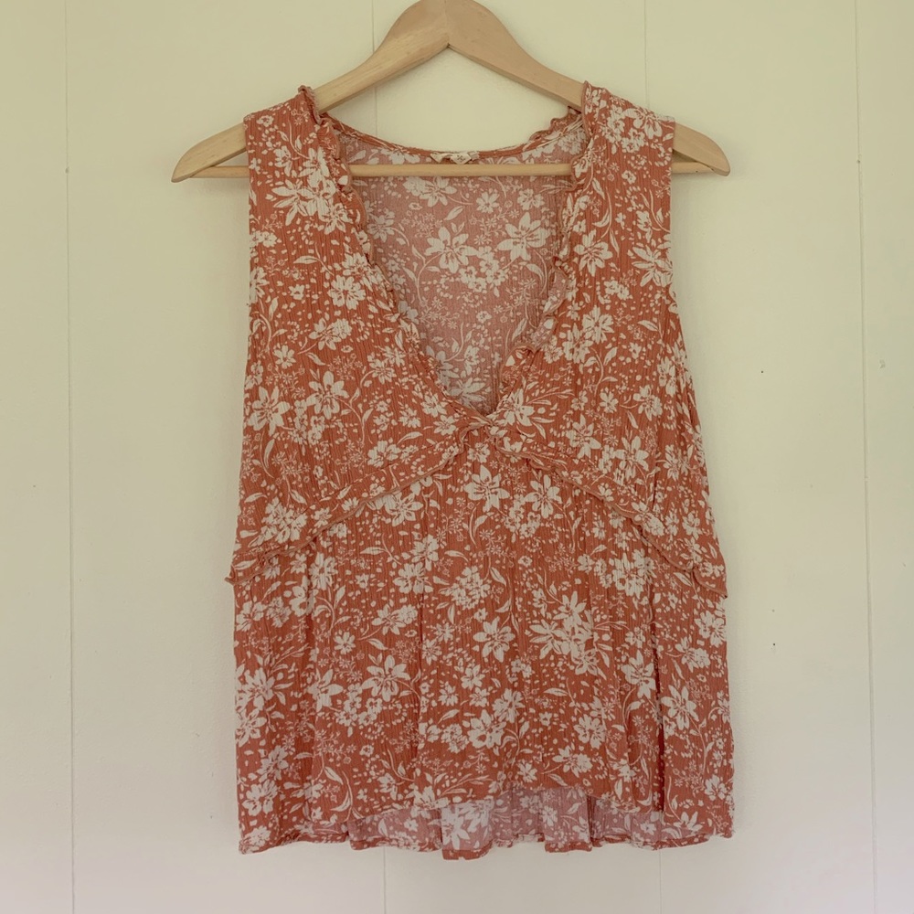 Sleeveless deep V blouse